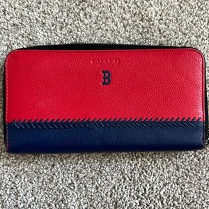 Coach wallet - nod to American baseball purchased in Japan. Wear on zip.
